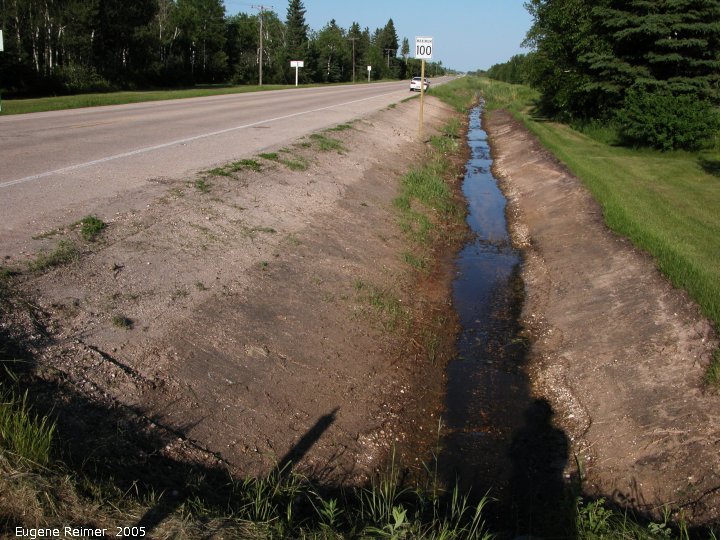IMG 2005-Jun20 at PTH15 east of Anola:  Ditch-work