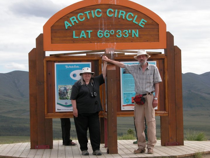 IMG 2008-Jul01 at the Arctic-Circle:  Doris+me at arctic-circle sign