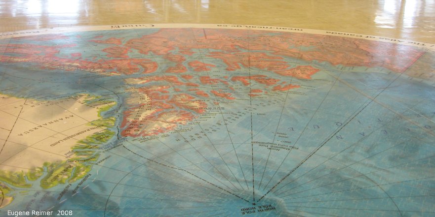 IMG 2008-Jul04 at the Inuvik airport:  map North America as seen from above the north-pole