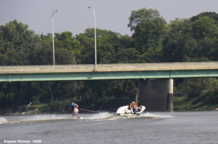 IMG 2009-Sep14 at Red River S of the forks:  water-skier and St-Vital Bridge