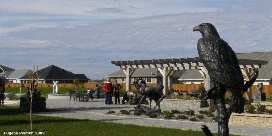 IMG 2009-Oct18 at Altona:  sculpture Bald eagle (Haliaeetus leucocephalus) with sculpture-park in background