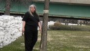 sandbag dike: at Kingston-Row under the St-Vital Bridge and Doris examining sticky trap