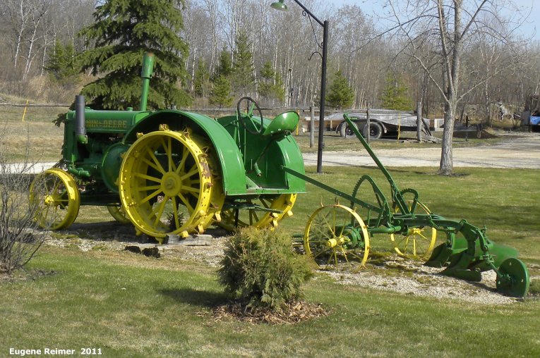 IMG 2011-Apr29 at St-Mary's Rd and SE-Winnipeg or East side of Red River:  John-Deere-model-D on steel with plow