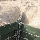 HESCO barrier dike: every eighth transverse connecter is doubled closer
