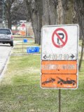 sign: No Parking 9:00 to 17:00 Street Work with towing picture with very long lens
