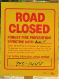 sign: Road Closed under Fire Prevention Act closeup