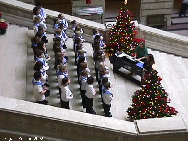 IMG 2002-Dec07 at MB-legislature:  ledge choir on steps