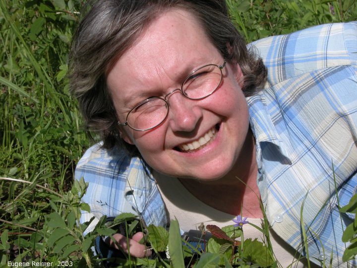 IMG 2003-Jun23 at RidingMountainPark:  cbc-hunt Peggy + Blue-eyed grass (Sisyrinchium montanum)