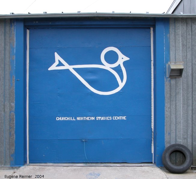 IMG 2004-Jul20 at near CNSC (afternoon):  birdfish-logo on garage-door