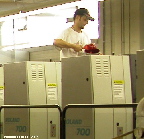 IMG 2005-Jun23 at Kromar Printing:  Kromar printing machinery gets fed