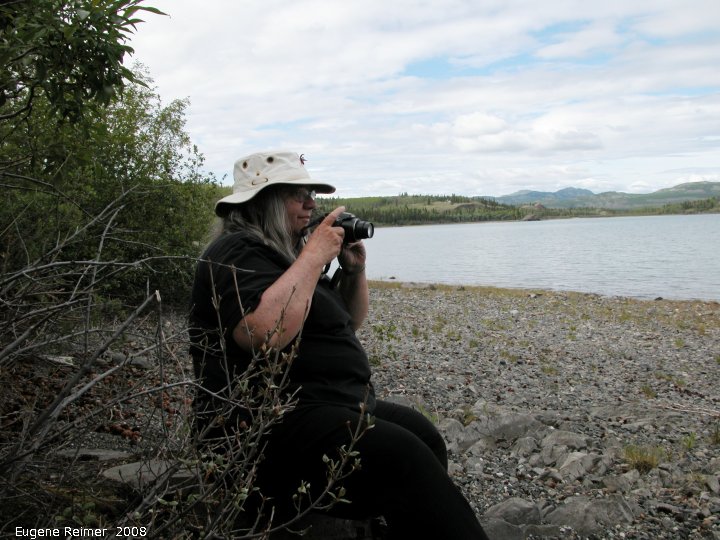 IMG 2008-Jun29 at Lake Laberge YT:&nbsp; photographer Doris on the marge of Lake Lebarge