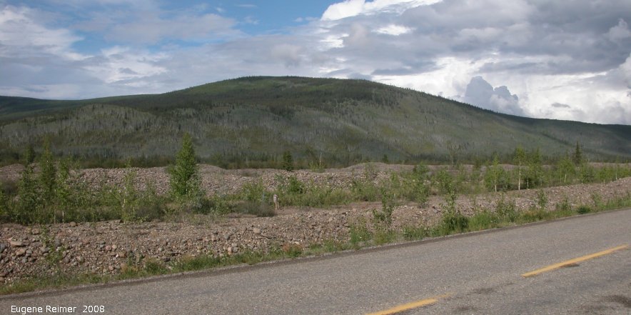 IMG 2008-Jul06 at outskirts of DawsonCity-YT:&nbsp; road lined with dredging-waste