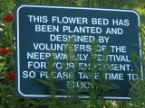 info: on flower-bed by Lily-Festival volunteers