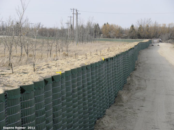 IMG 2011-Apr29 at Pembina Hwy near St-Adolph:&nbsp; HESCO barrier dike many kilometers long with long lens