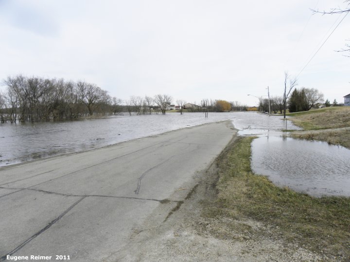 IMG 2011-Apr29 at St-Norbert of Winnipeg:  flood water on road