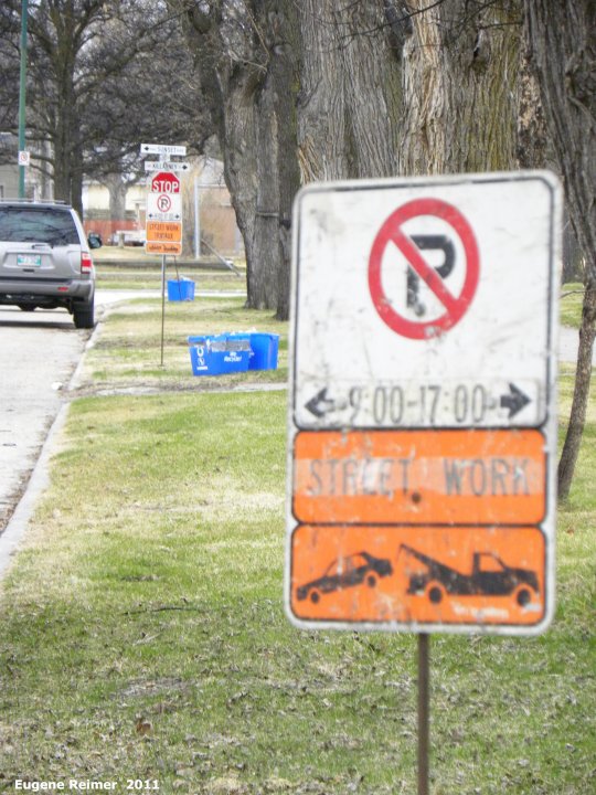 IMG 2011-Apr29 at Winnipeg:  sign No Parking 9:00 to 17:00 Street Work with towing picture with very long lens