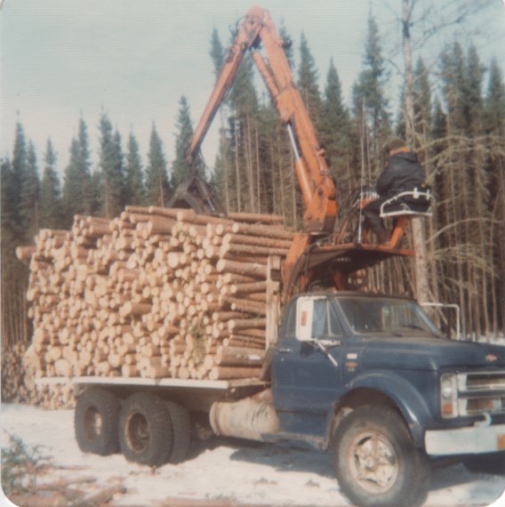 IMG 2006-Jun11 at  h2 Photos collected for the K P L Reimer gathering:  KPL6 10 truck with logs 1977 from:mildred